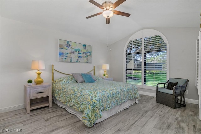 28908 Marsh Elder Ct, Bonita Springs, FL 34135 - bedroom featuring wood finished floors, baseboards, vaulted ceiling, and ceiling fan