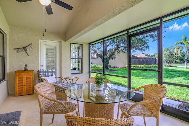 28908 Marsh Elder Ct, Bonita Springs, FL 34135 - sunroom featuring a ceiling fan, healthy amount of natural light, outdoor dining area, and lofted ceiling