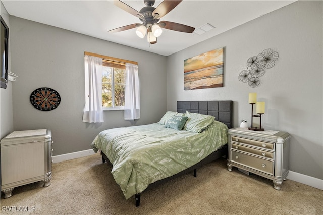 15120 Piping Plover Ct Unit 102, North Fort Myers, FL 33917 - carpeted bedroom with baseboards and ceiling fan