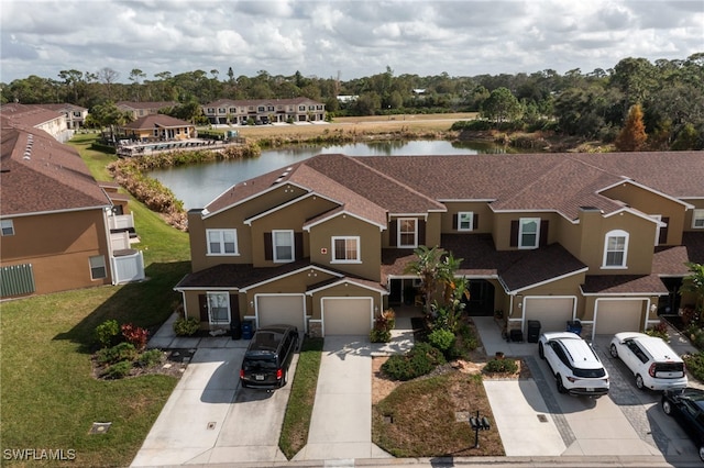 15120 Piping Plover Ct Unit 102, North Fort Myers, FL 33917 - aerial perspective of suburban area featuring a large body of water
