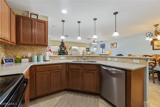 15120 Piping Plover Ct Unit 102, North Fort Myers, FL 33917 - kitchen featuring dishwasher, a sink, brown cabinetry, and recessed lighting