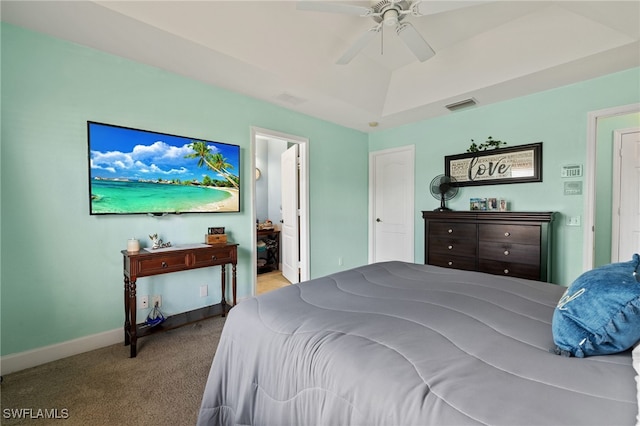 15120 Piping Plover Ct Unit 102, North Fort Myers, FL 33917 - bedroom with carpet flooring, a tray ceiling, baseboards, ceiling fan, and ensuite bathroom