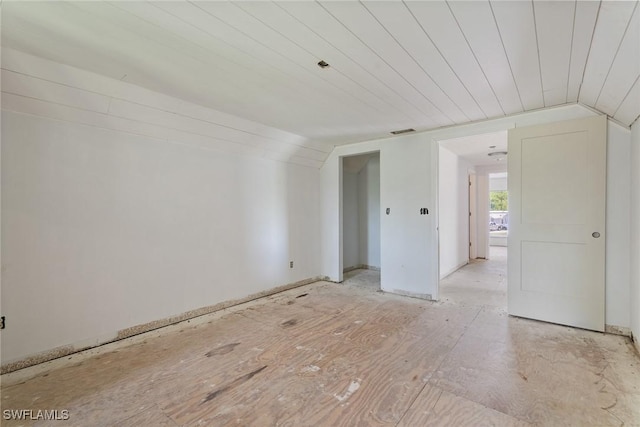 8172 Sanibel Blvd, Fort Myers, FL 33967 - spare room featuring lofted ceiling