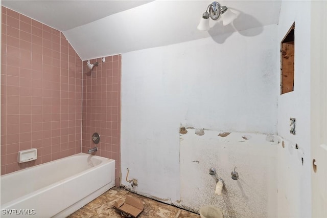 8172 Sanibel Blvd, Fort Myers, FL 33967 - bathroom featuring shower / bath combination and lofted ceiling