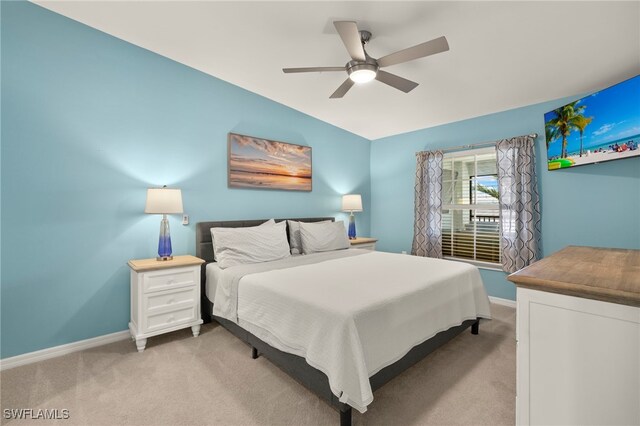 15960 Grassland Ln Unit 2726, Punta Gorda, FL 33982 - bedroom with light colored carpet, baseboards, and a ceiling fan