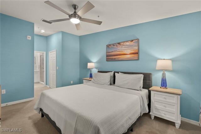 15960 Grassland Ln Unit 2726, Punta Gorda, FL 33982 - bedroom with carpet, baseboards, ensuite bathroom, and ceiling fan