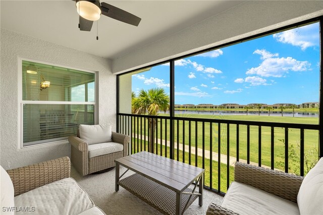 15960 Grassland Ln Unit 2726, Punta Gorda, FL 33982 - sunroom / solarium with a water view, a ceiling fan, and plenty of natural light