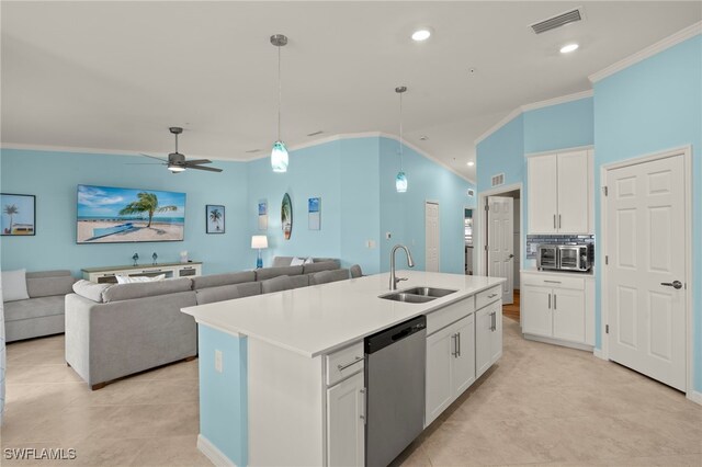 15960 Grassland Ln Unit 2726, Punta Gorda, FL 33982 - kitchen with dishwasher, a sink, ornamental molding, white cabinets, and a center island with sink