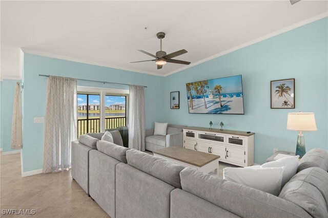 15960 Grassland Ln Unit 2726, Punta Gorda, FL 33982 - living room with ornamental molding, a ceiling fan, vaulted ceiling, baseboards, and light tile patterned flooring