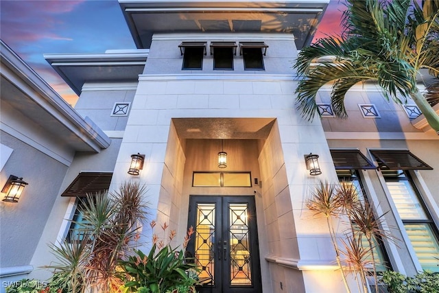9010 Arrezo Ct, Naples, FL 34119 - view of exterior entry with french doors