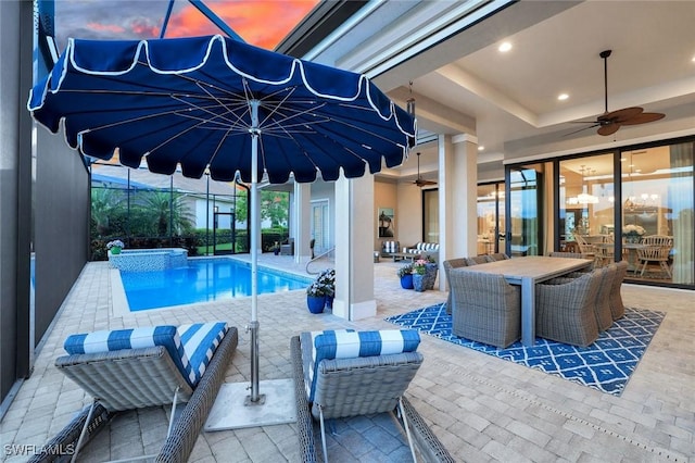 9010 Arrezo Ct, Naples, FL 34119 - outdoor pool featuring ceiling fan, a patio, and outdoor dining area