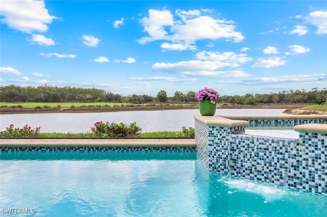 9010 Arrezo Ct, Naples, FL 34119 - view of swimming pool featuring a water view