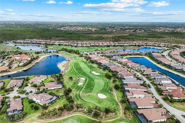 9010 Arrezo Ct, Naples, FL 34119 - aerial view of property and surrounding area featuring nearby suburban area and a large body of water