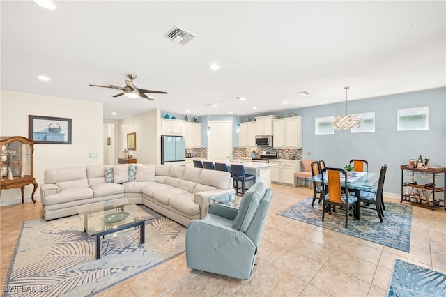 14687 Topsail Dr, Naples, FL 34114 - living room with plenty of natural light, light tile patterned flooring, a ceiling fan, recessed lighting, and baseboards
