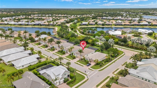 14687 Topsail Dr, Naples, FL 34114 - aerial view of residential area with a nearby body of water