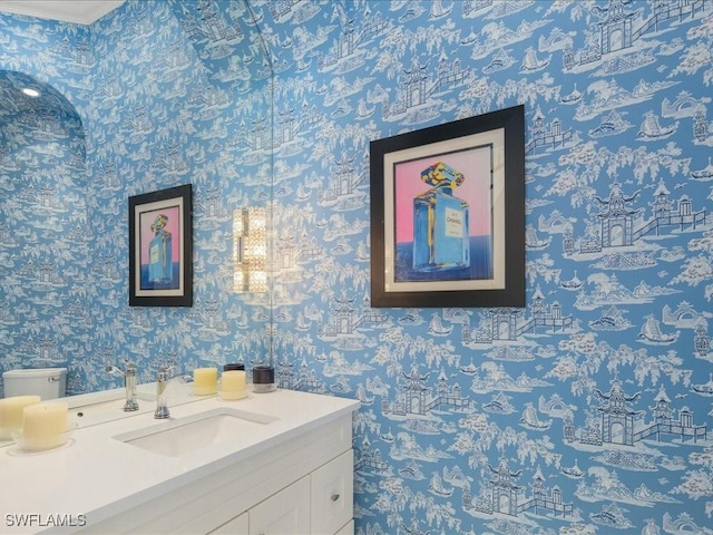 434 Conners Ave, Naples, FL 34108 - bathroom with vanity and wallpapered walls