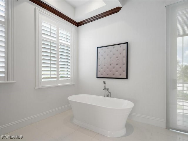 434 Conners Ave, Naples, FL 34108 - full bath featuring a freestanding tub and tile patterned flooring