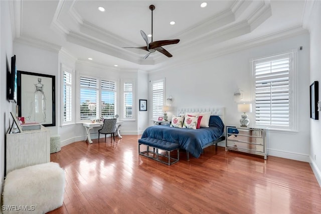 434 Conners Ave, Naples, FL 34108 - bedroom with a raised ceiling, wood finished floors, ornamental molding, recessed lighting, and a ceiling fan