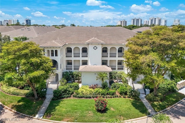 795 Bentwater Cir Unit 202, Naples, FL 34108 - view of building exterior featuring stairs