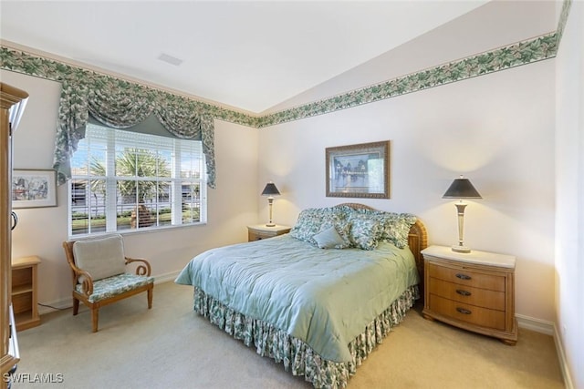 795 Bentwater Cir Unit 202, Naples, FL 34108 - bedroom with carpet floors, vaulted ceiling, and baseboards