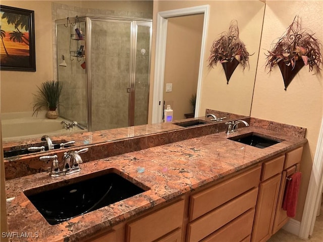 17560 Brickstone Loop, Fort Myers, FL 33967 - bathroom featuring a shower stall, double vanity, and a bath