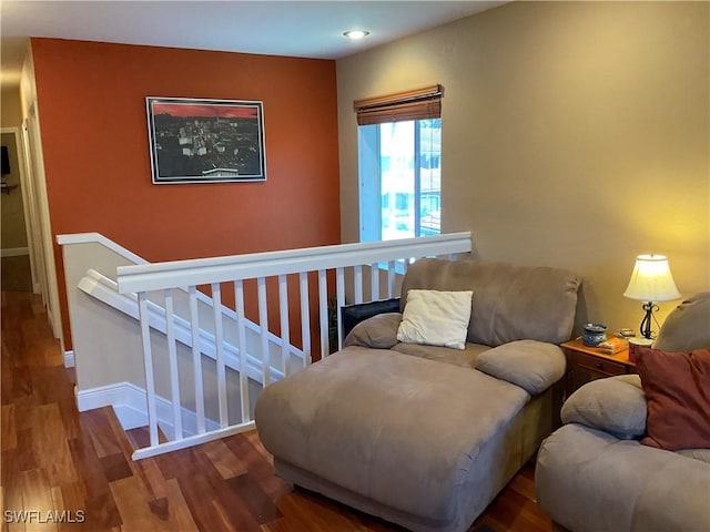 17560 Brickstone Loop, Fort Myers, FL 33967 - sitting room with wood finished floors, an upstairs landing, baseboards, and recessed lighting