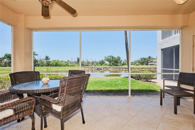16410 Millstone Cir Unit 102, Fort Myers, FL 33908 - sunroom / solarium with ceiling fan, a water view, and outdoor dining space