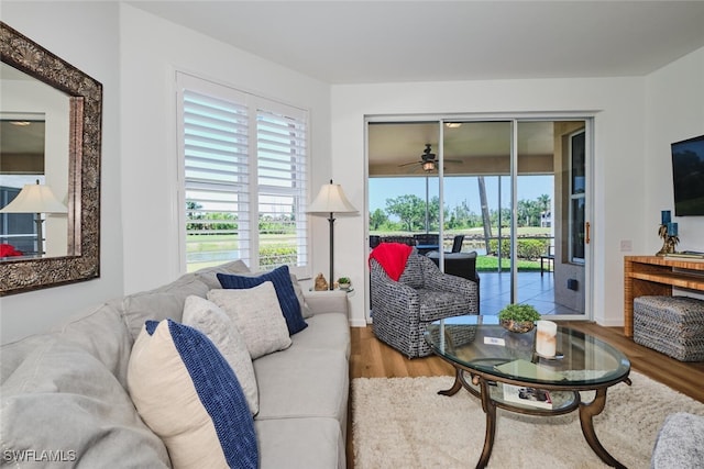 16410 Millstone Cir Unit 102, Fort Myers, FL 33908 - living room with wood finished floors and a ceiling fan