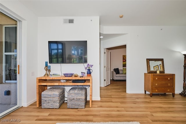 16410 Millstone Cir Unit 102, Fort Myers, FL 33908 - living room with wood finished floors and baseboards