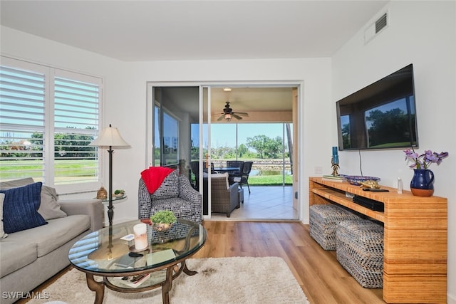 16410 Millstone Cir Unit 102, Fort Myers, FL 33908 - living room featuring wood finished floors and a ceiling fan
