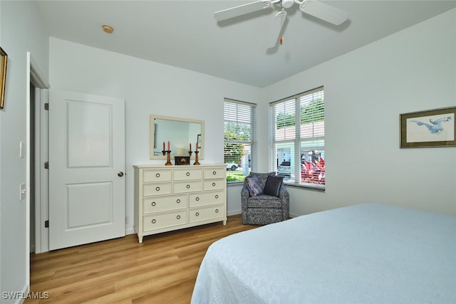 16410 Millstone Cir Unit 102, Fort Myers, FL 33908 - bedroom featuring light wood-style floors and a ceiling fan
