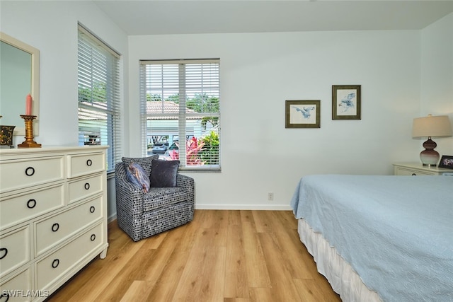 16410 Millstone Cir Unit 102, Fort Myers, FL 33908 - bedroom featuring light wood-style floors and baseboards