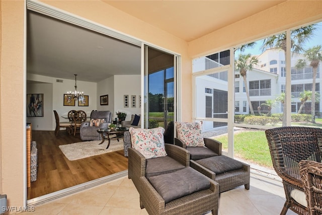 16410 Millstone Cir Unit 102, Fort Myers, FL 33908 - sunroom / solarium with a chandelier