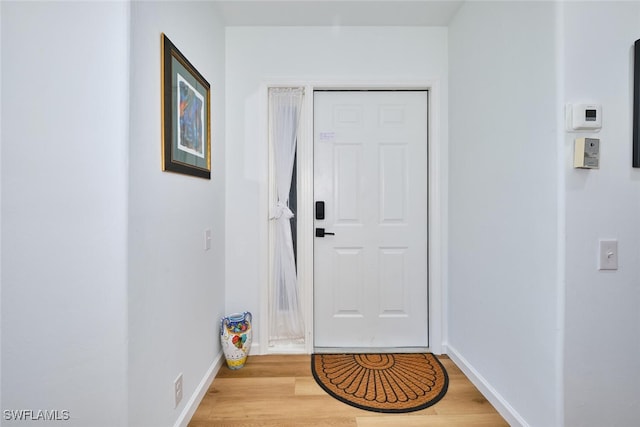 16410 Millstone Cir Unit 102, Fort Myers, FL 33908 - entryway featuring light wood-style floors and baseboards