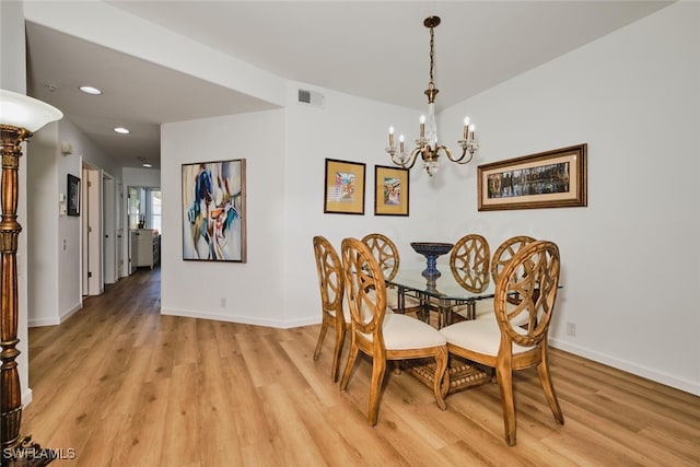16410 Millstone Cir Unit 102, Fort Myers, FL 33908 - dining room featuring light wood-style flooring, a chandelier, baseboards, and recessed lighting