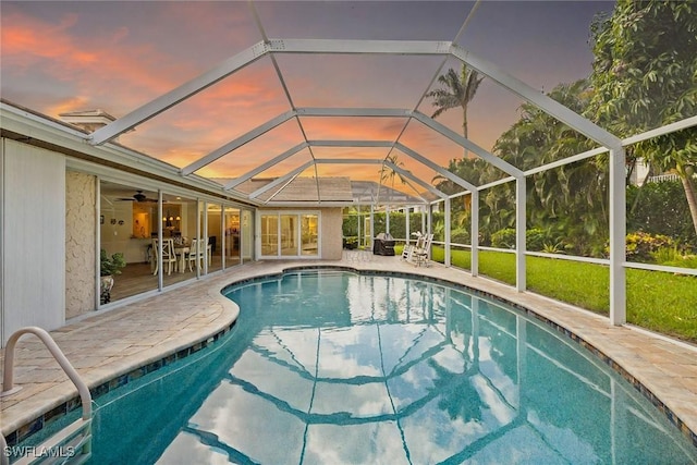 636 Park Shore Dr, Naples, FL 34103 - outdoor pool featuring a patio area and glass enclosure