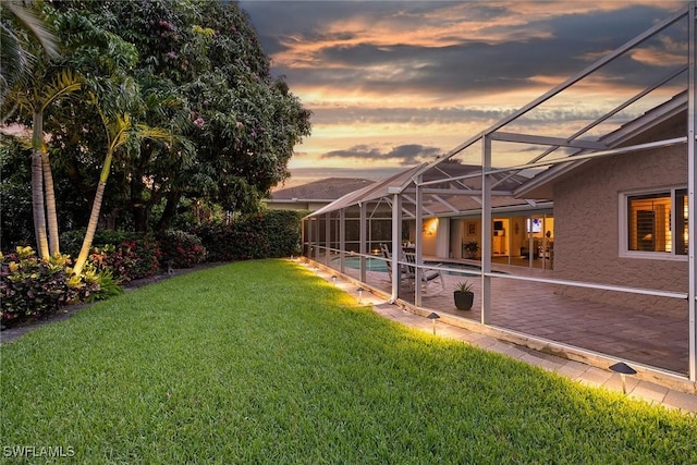 636 Park Shore Dr, Naples, FL 34103 - view of green lawn with a patio, a lanai, and an outdoor pool