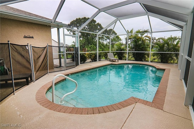 1129 NW 19th Ave, Cape Coral, FL 33993 - outdoor pool featuring a patio area and glass enclosure
