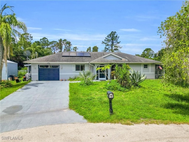2907 Ashburn St, Lehigh Acres, FL 33972 - single story home featuring stucco siding, an attached garage, roof mounted solar panels, a front lawn, and driveway