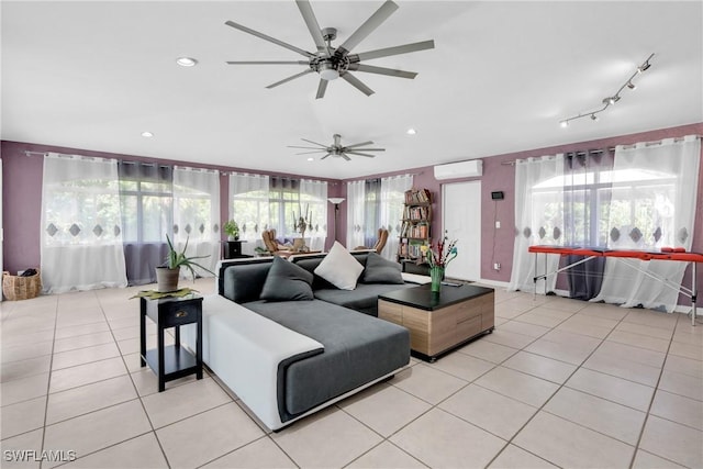 2907 Ashburn St, Lehigh Acres, FL 33972 - living area featuring a wall unit AC, a ceiling fan, and light tile patterned floors