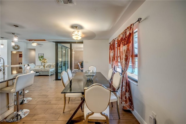 141 SW 39th St, Cape Coral, FL 33914 - dining room with a ceiling fan