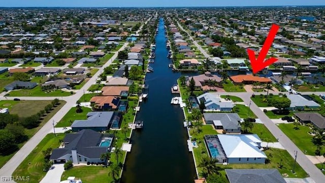 141 SW 39th St, Cape Coral, FL 33914 - aerial view of property's location featuring nearby suburban area and a large body of water