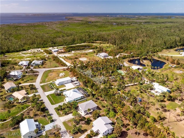 7836 Grande Pine Rd, Bokeelia, FL 33922 - aerial view of property's location featuring a heavily wooded area and a large body of water