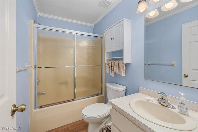 7836 Grande Pine Rd, Bokeelia, FL 33922 - full bathroom featuring vanity, crown molding, bath / shower combo with glass door, toilet, and wood finished floors