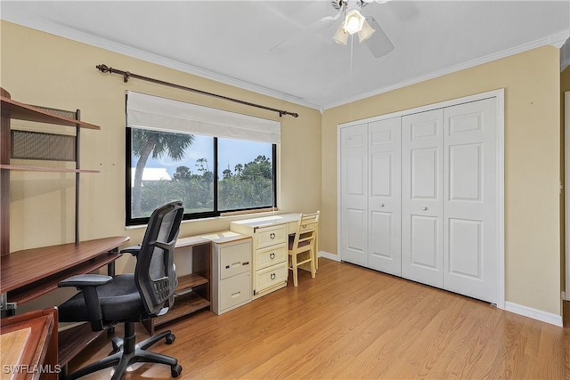 7836 Grande Pine Rd, Bokeelia, FL 33922 - home office with light wood-type flooring, ornamental molding, a ceiling fan, and baseboards