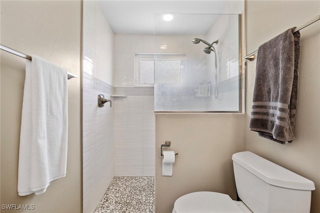 1929 NW 18th St, Cape Coral, FL 33993 - bathroom featuring toilet and tiled shower