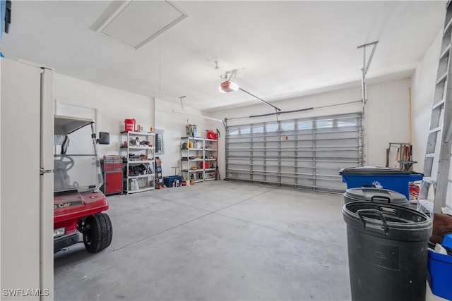 2871 Bracci Dr, Saint James City, FL 33956 - garage featuring a garage door opener