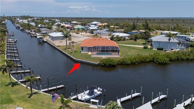 2871 Bracci Dr, Saint James City, FL 33956 - aerial view of residential area featuring a large body of water