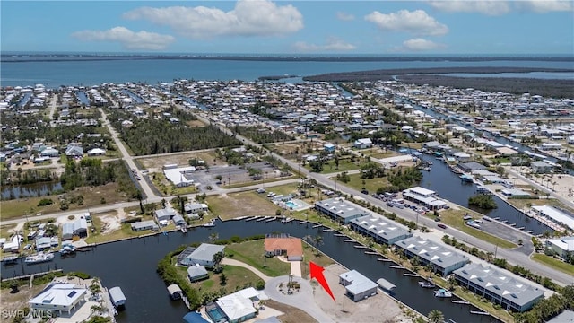 2871 Bracci Dr, Saint James City, FL 33956 - aerial view of property's location with a large body of water and nearby suburban area