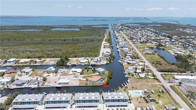 2871 Bracci Dr, Saint James City, FL 33956 - aerial overview of property's location with a nearby body of water and nearby suburban area